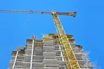 Naklejka premium Crane and highrise construction site