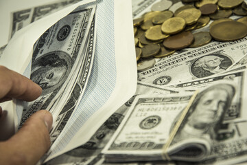 Finance concept. Money stacks and in the envelope. Hundred dollar banknotes isolated on white background. Money concept. Stack growing business.