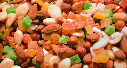 Nuts and candied fruits closeup background