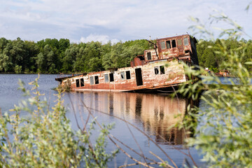 Fototapeta na wymiar rusty shipwreck in chernobyl