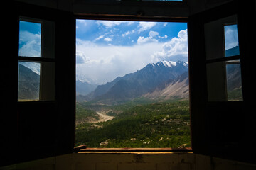 View to Karimabad and Hunza valley through the Baltit fort window, Pakistan