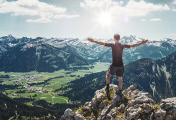 Man Enjoying View of Mountains in Allgau Alps