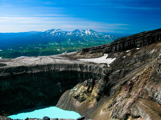 Crater acid lake in Gorely volcano, Kamchatka peninsula, Russia