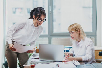 Two women in office