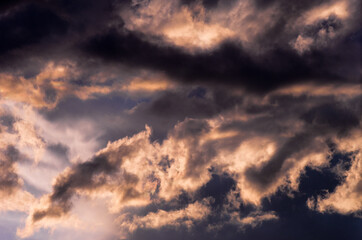 Dramatic sunset sky with colorful clouds after thunderstorm