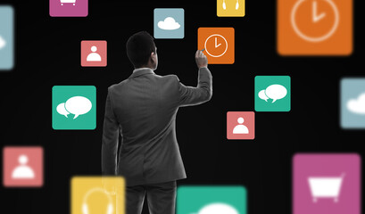 businessman working with marker and virtual icons