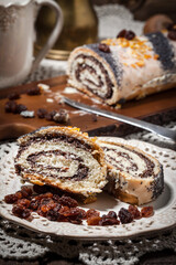 Pieces of poppy seed cake on a plate.