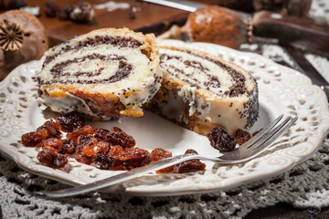 Pieces of poppy seed cake on a plate.