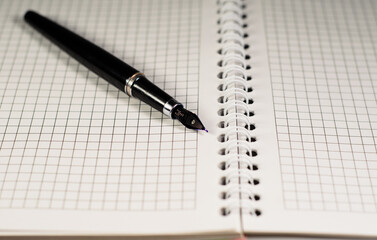 Open notebook with fountain pen