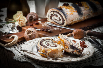 Pieces of poppy seed cake on a plate.