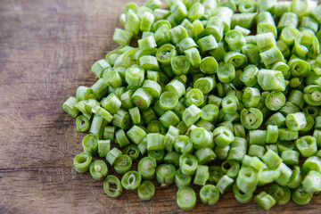 Fresh sliced cowpea on wood table.Healthy organic vegetable food