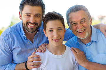 Boy with father and grandfather
