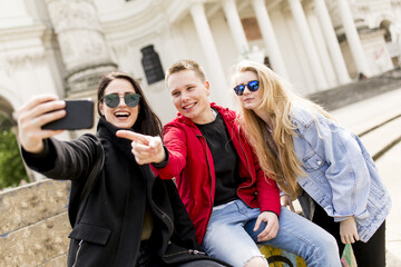 Young people taking selfie in Vienna, Austria