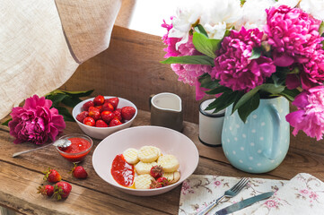 Dumplings from rice flour and cottage cheese with a pitted strawberry