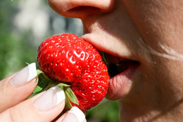 strawberry on lips