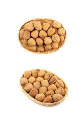 Wicker basket of walnuts isolated