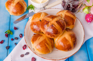 Easter hot cross buns with dried cranberries and raisins