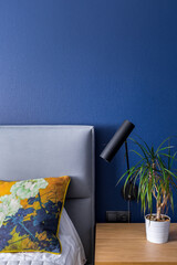 Bedroom with cobalt blue wallpaper
