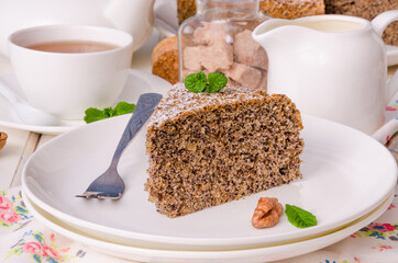 Poppy cake with walnuts and vanilla custard