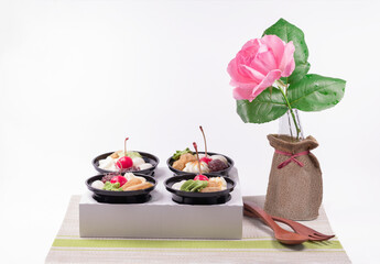 Dessert with red berries and green tea Cream