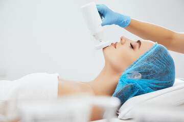 Naklejka premium Woman lying on procedure of brossage