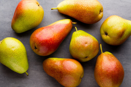 Pears isolated on the gray background.