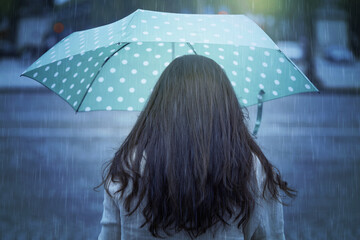 Woman with umbrella 

