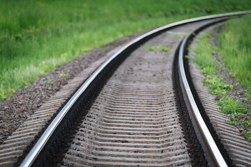 Fototapeta na wymiar Railroad tracks on the turn