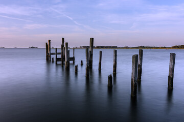 Long Exposure of Old Dock Pilings at Sunrise