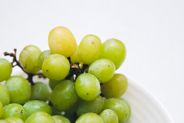 Green grape on white background