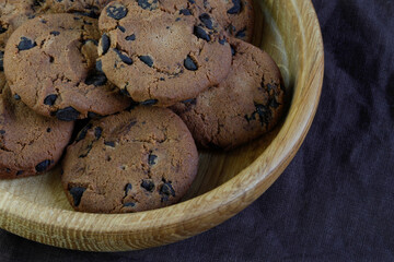 Chocolate chip cookies on dark background