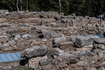 Minoan palace at Knossos on Greek Mediterranean island of Crete partially reconstructed by English archaeologist Arthur Evans. Detail of ancient ruins.
