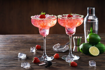 Two glasses of freshly made  strawberry Margarita cocktail