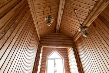 Fototapeta na wymiar The bathroom in a rustic log cabin, in the mountains. with a beautiful interior. house of pine logs