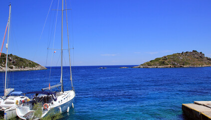 Fototapeta na wymiar Yachts in Agios Nikolaos port on Zakynthos