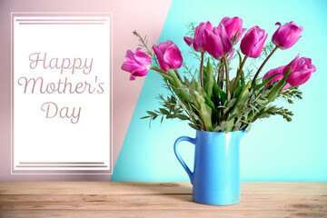 Jug with beautiful bouquet of spring flowers on wooden table