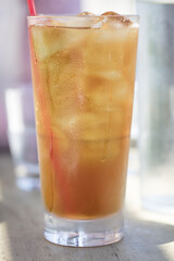 Glass of Iced Tea with Ice and Straw