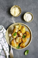 Roasted cauliflower with yogurt sauce and cheese.Top view.
