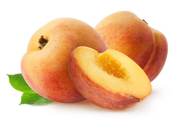 Peach isolated. Two whole peach fruits with half and leaves isolated on white with clipping path