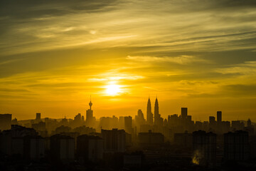Naklejka na ściany i meble View of downtown Kuala Lumpur during majestic sunset