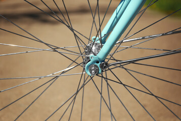 Fototapeta premium Closeup view of bicycle wheel spokes