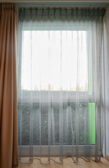 Big window and beautiful curtains indoors