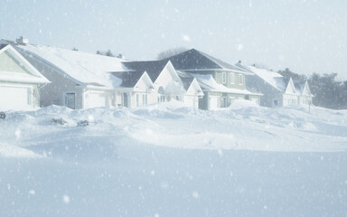 Fototapeta na wymiar Snow falling in a North American neighborhood.