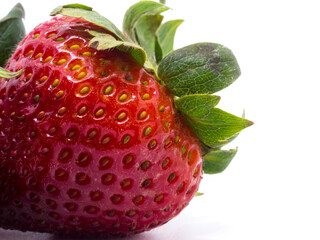 Closeup shot of fresh strawberries. Isolated on white background.