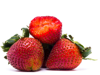 Closeup shot of fresh strawberries. Isolated on white background.