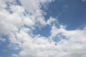 White Clouds Over a Blue Sky on a Sunny Day