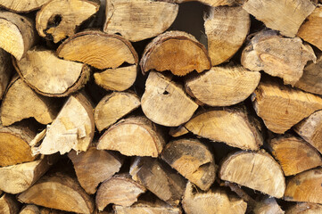 Fototapeta premium Stacked Cut Fire Wood for Backgrounds