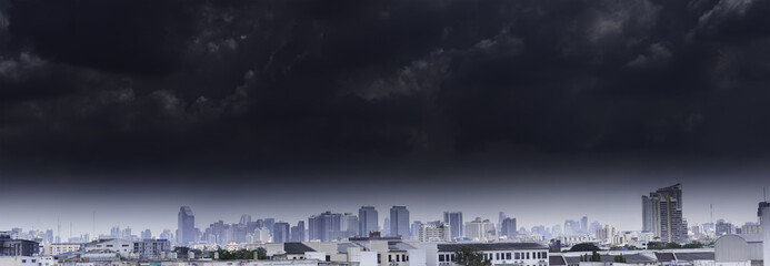 Panorama of Bangkok city view with gray cloud before raining.