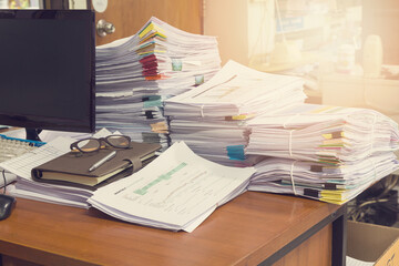Pile of unfinished documents on office desk, Stack of business paper,Vintage Effect