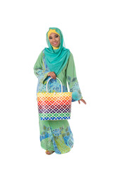 Beautiful asian muslimah woman with bright wicker tote bag.Isolated